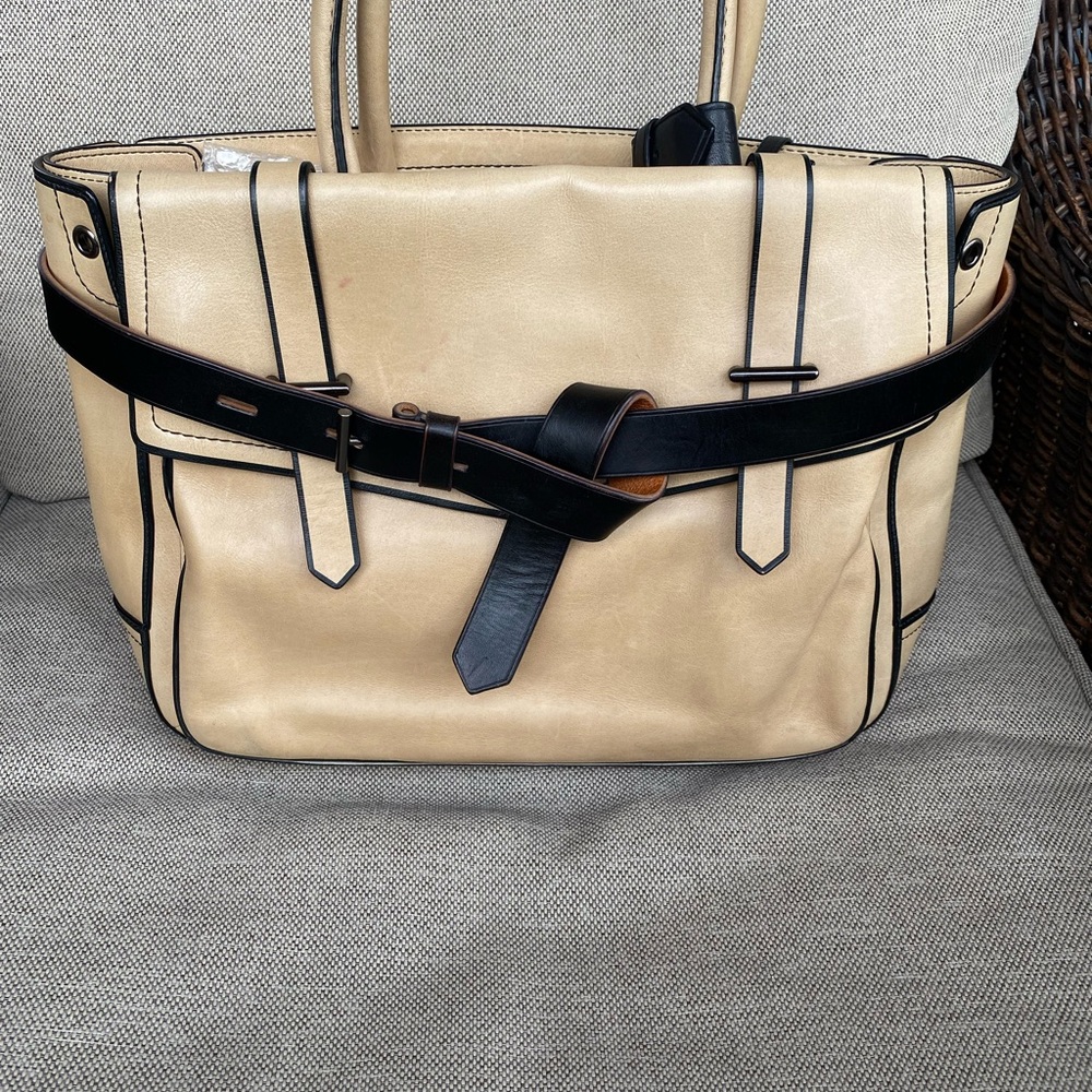 REED KRAKOFF Beige with Black Trimmed Leather "Boxer" Tote Bag.